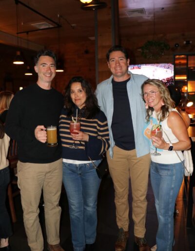 Cocktails for a Cause – two couples posing for the camera
