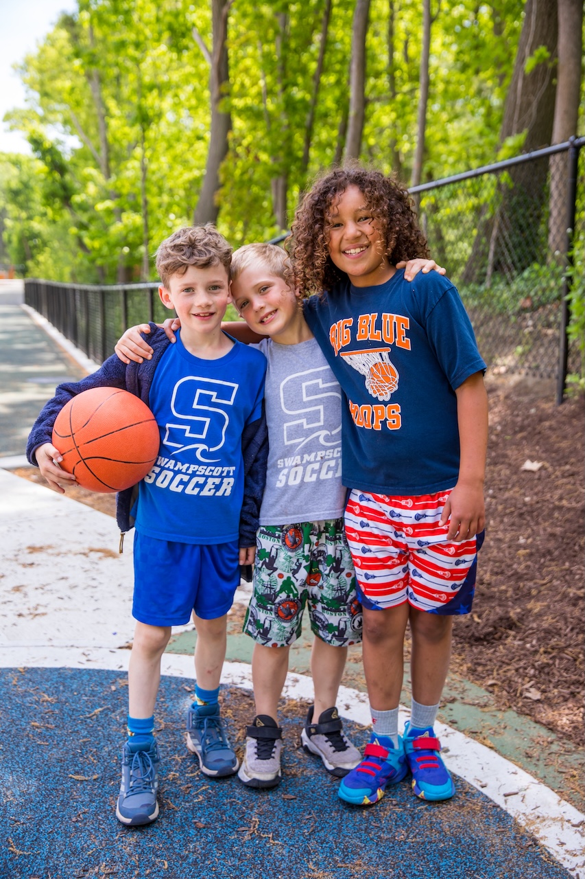 three boys smiling for the camera holding a basketball swampscott elementary three boys smiling for the camera holding a basketball swampscott elementary